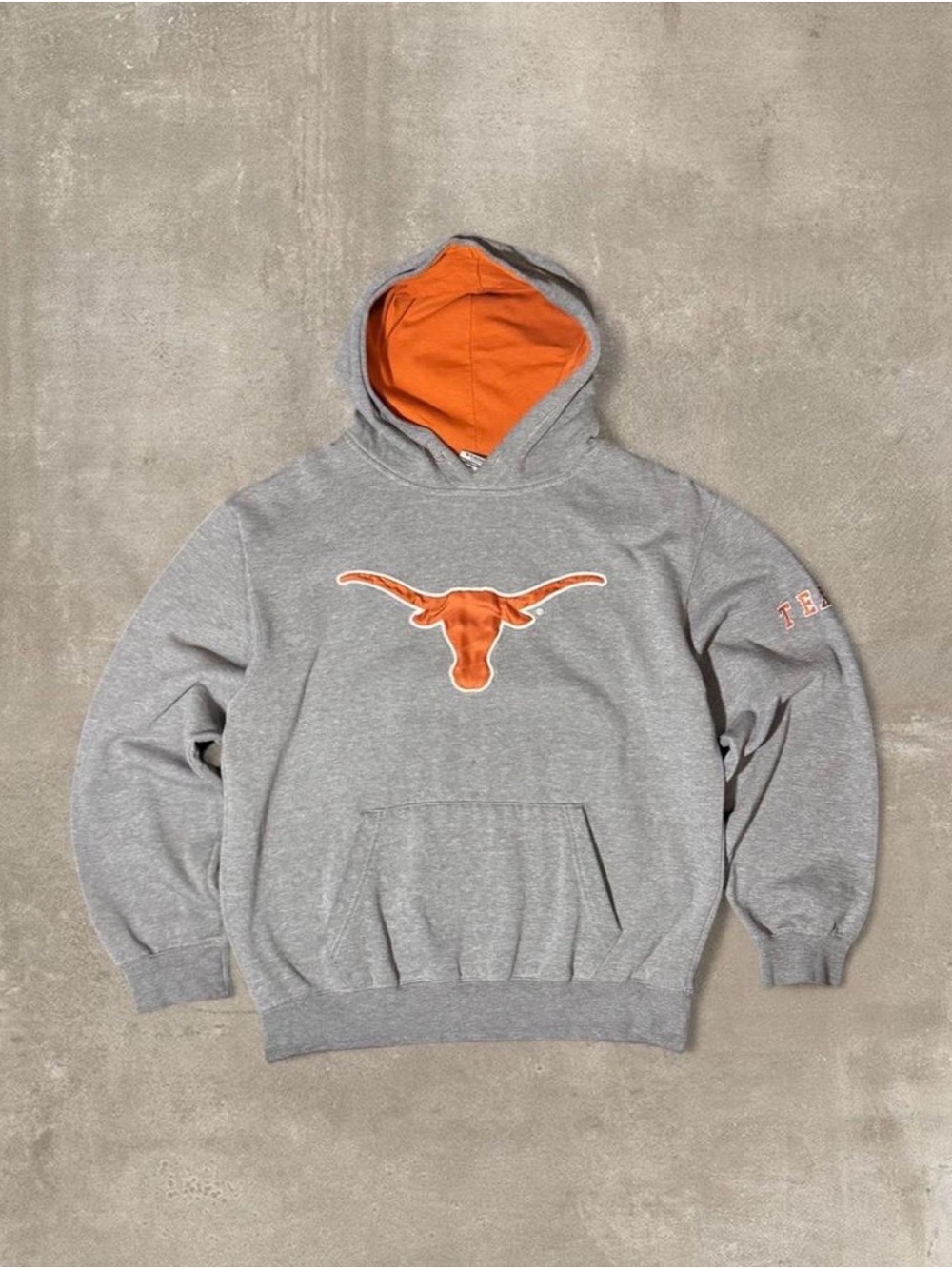 Gray Texas Longhorns hoodie with orange longhorn graphic